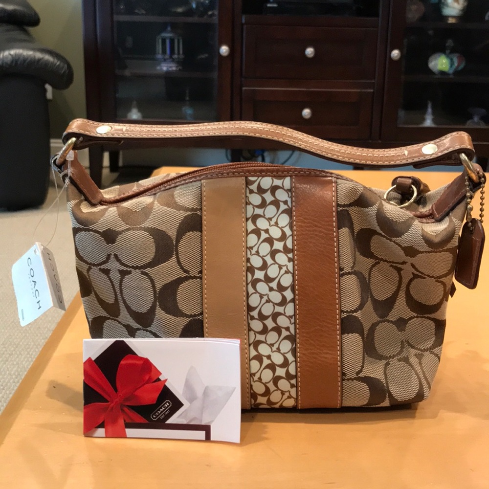 Coach Handle Bag with Tassel Never used WITH TAGS